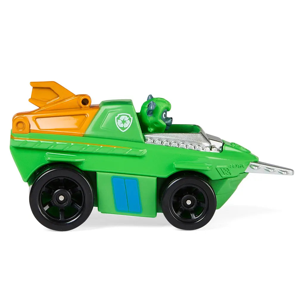 Green die-cast Paw Patrol Rocky Aqua Pups vehicle with smooth plastic body, elongated side profile, recycling tool arm detail, and black wheels on a plain white background.