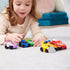 Paw Patrol Aqua Pups toy cars in vibrant plastic colors with smooth finish, compact rounded vehicle shapes for imaginative play, shown with a young child on a soft carpet indoor playroom setting.