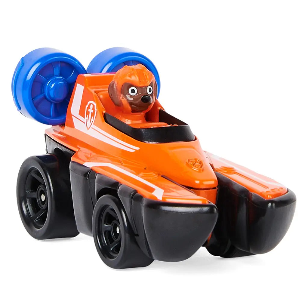 PAW Patrol Zuma die-cast vehicle in orange and black metal with blue fan accents, compact rounded hovercraft design for kids rescue play, angled product view on a plain white studio backdrop