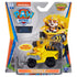 PAW Patrol Rubble Dino Rescue toy yellow die cast metal truck with black textured wheels and gray scoop, shown in retail packaging with Nickelodeon branding and colorful jungle themed background.