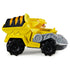 PAW Patrol Rubble Dino Rescue vehicle yellow die cast metal truck with black chunky wheels and gray articulated scoop arm, shown in side profile on plain white background highlighting construction design.