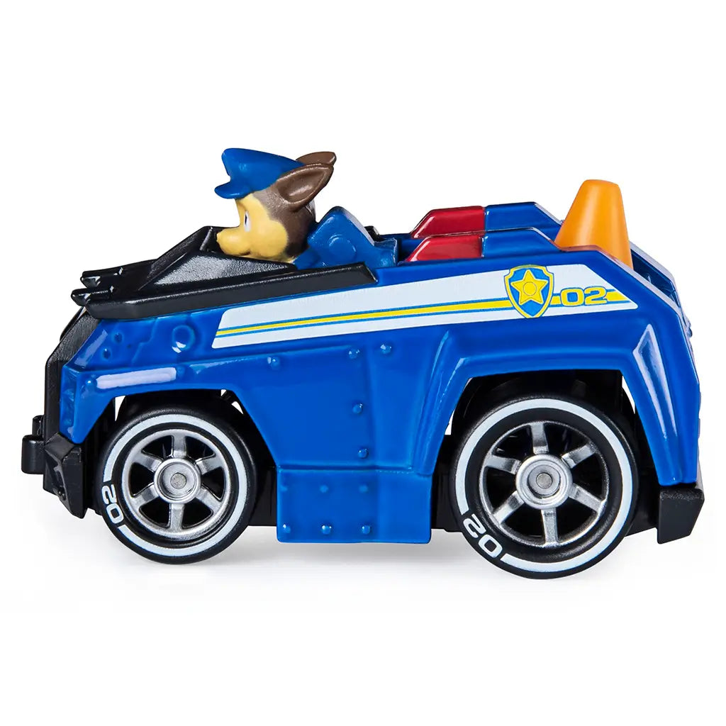 Blue die-cast Paw Patrol Chase police vehicle with black wheels, silver rims, and yellow stripe detail, low-profile rescue truck form shown in side view on a white background.