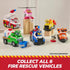 PAW Patrol fire rescue vehicles collection in multicolor plastic with character figures in helmets, arranged on wooden blocks to showcase themed trucks and helicopter against a light indoor backdrop.