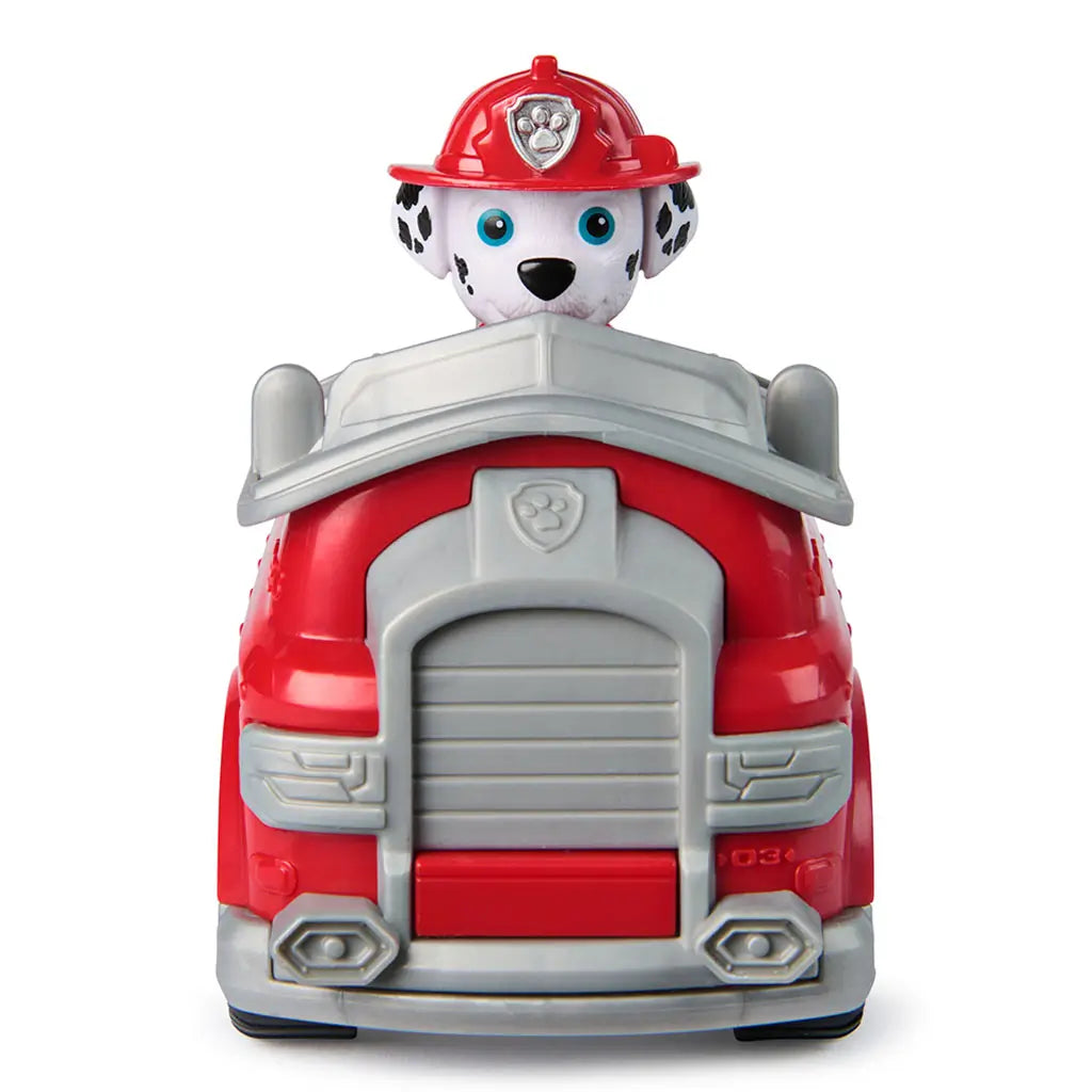 Front view of Paw Patrol Marshall fire engine toy, with Marshall pup figure visible in driver’s seat, red fire truck body, and gray grille detailing.