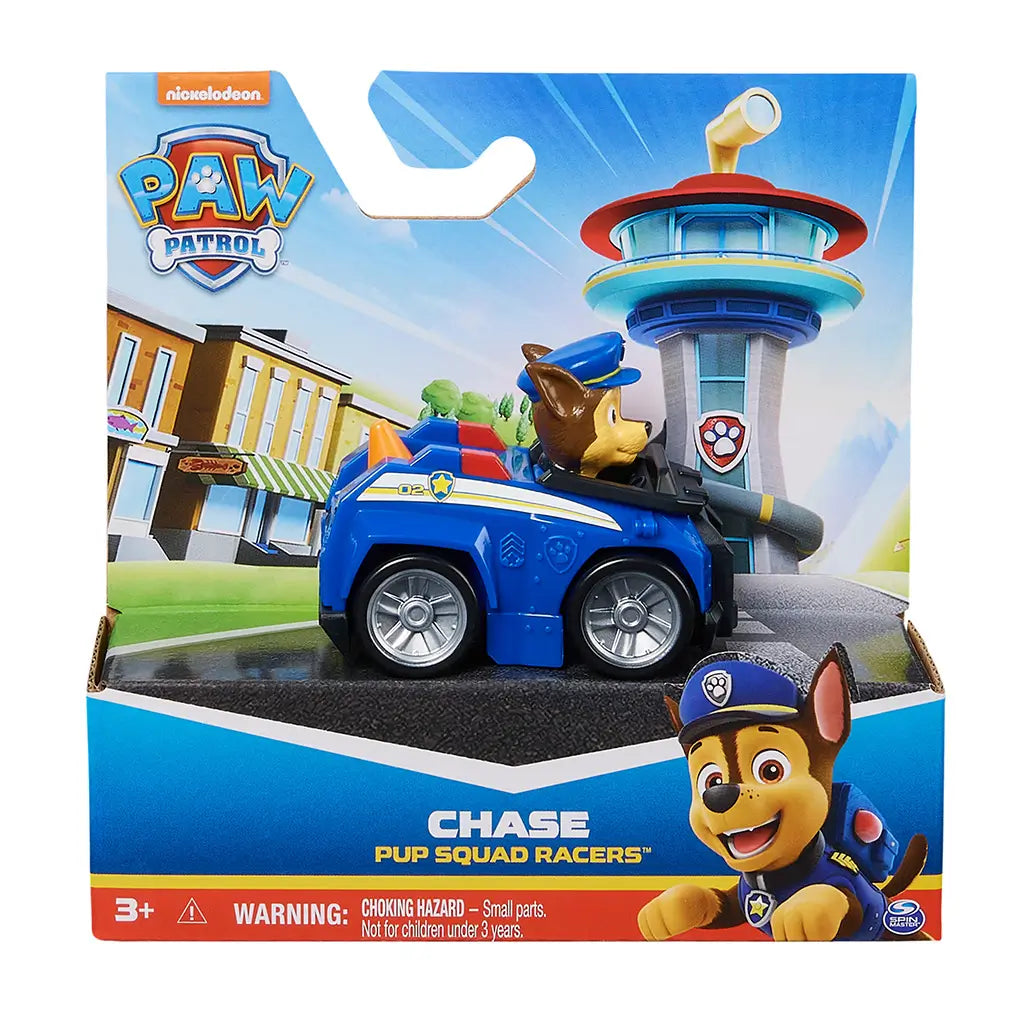 Paw Patrol Chase Pup Squad Racers toy in blue plastic vehicle with silver wheels and brown character figure, packaged in colorful Nickelodeon retail box, displayed against illustrated Adventure Bay backdrop for retail shelf presentation