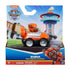 Paw Patrol Zuma Pup Squad Racers toy in orange plastic hovercraft vehicle with silver wheels and brown pup figure, packaged in colorful Nickelodeon retail box, displayed against Adventure Bay backdrop for retail shelf presentation