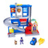 PAW Patrol Pup Squad Search and Rescue HQ playset in blue and gray plastic with red ramp and elevator, complete rescue station set shown with figures, vehicle and accessories arranged on a white background.