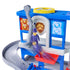 PAW Patrol Pup Squad Search and Rescue HQ playset in blue and gray plastic with red rotating elevator arm and slide platform, action feature demonstrated with character figure inside rescue tower on a white background.