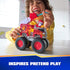 PAW Patrol Marshall fire truck toy features bright red plastic body with flame graphics, smooth and textured surfaces, oversized wheels, and character figure, used by child during imaginative pretend play indoors.
