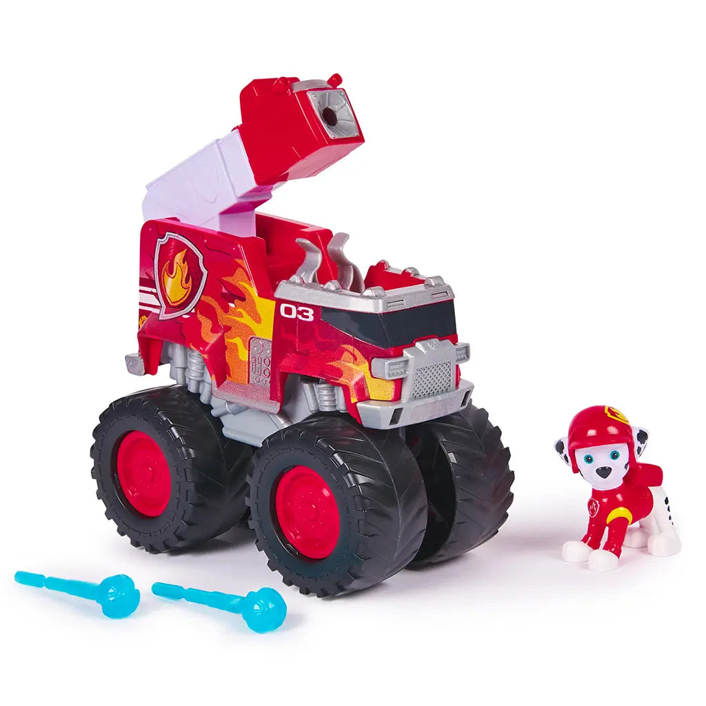 PAW Patrol Marshall fire truck toy features bright red plastic body with glossy and textured flame graphics, chunky oversized wheels, and ladder launcher, displayed with figure and accessories on a clean white background.