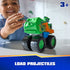 PAW Patrol Rocky recycle truck toy features bright green plastic body with textured panels, oversized wheels, and projectile launcher accessory, shown in child’s hands during engaging tabletop play scene.