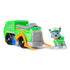 Paw Patrol Rocky recycle truck toy with removable Rocky pup figure, green truck design with black wheels, gray front, orange arms, and recycling symbol details.