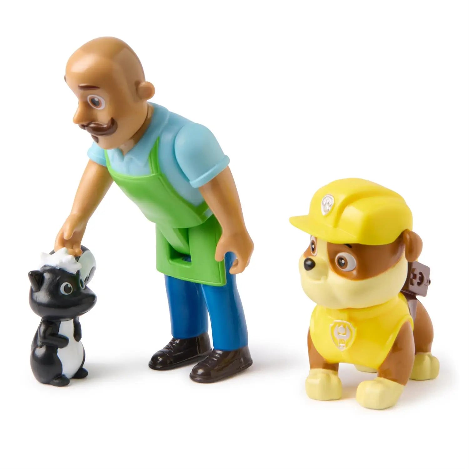Paw Patrol toy set with Rubble dog figure in yellow helmet, Mr. Porter figure in green apron and blue shirt, and black-and-white skunk displayed on white background.