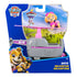 Paw Patrol Skye helicopter toy in retail packaging, featuring gray and pink helicopter with rotating blades and Skye pup figure in pink aviator goggles and vest.