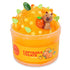 Bright orange icee slime with a textured, fizzy look, topped with a capybara figurine holding an orange, citrus slice confetti, and green leaf charms, packaged in a jar labeled Capybara Treats Icee Slime.