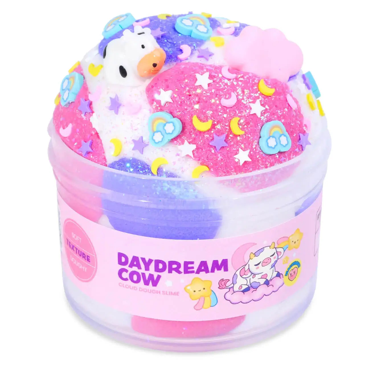 Pink, purple, and white cloud dough slime with a soft texture, topped with a cow figurine, moon and star confetti, and rainbow sprinkles, packaged in a jar labeled Daydream Cow Cloud Dough Slime.