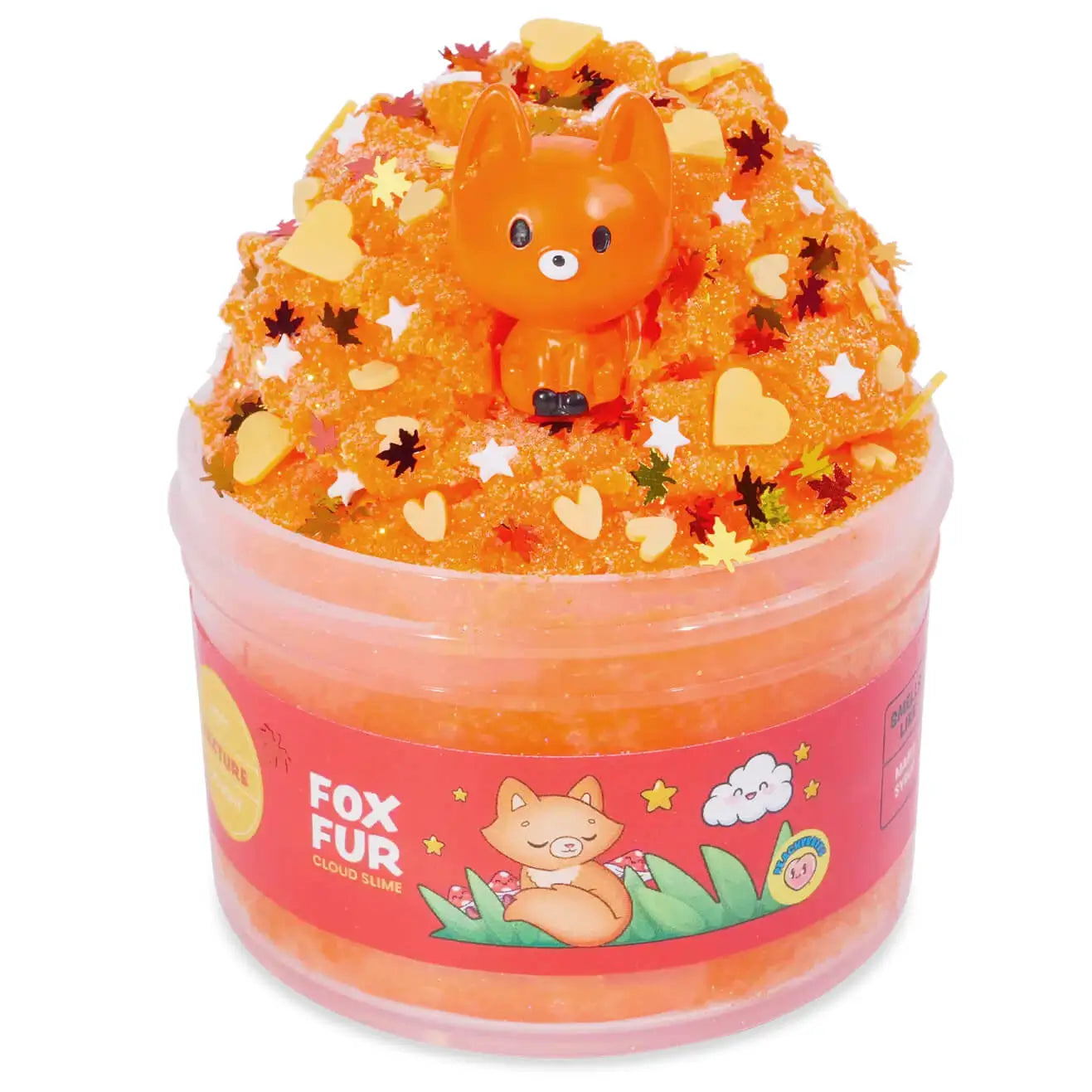 Bright orange cloud slime with a fluffy texture, topped with a cute fox figurine, heart confetti, leaf shapes, and white stars, packaged in a jar labeled Fox Fur Cloud Slime.