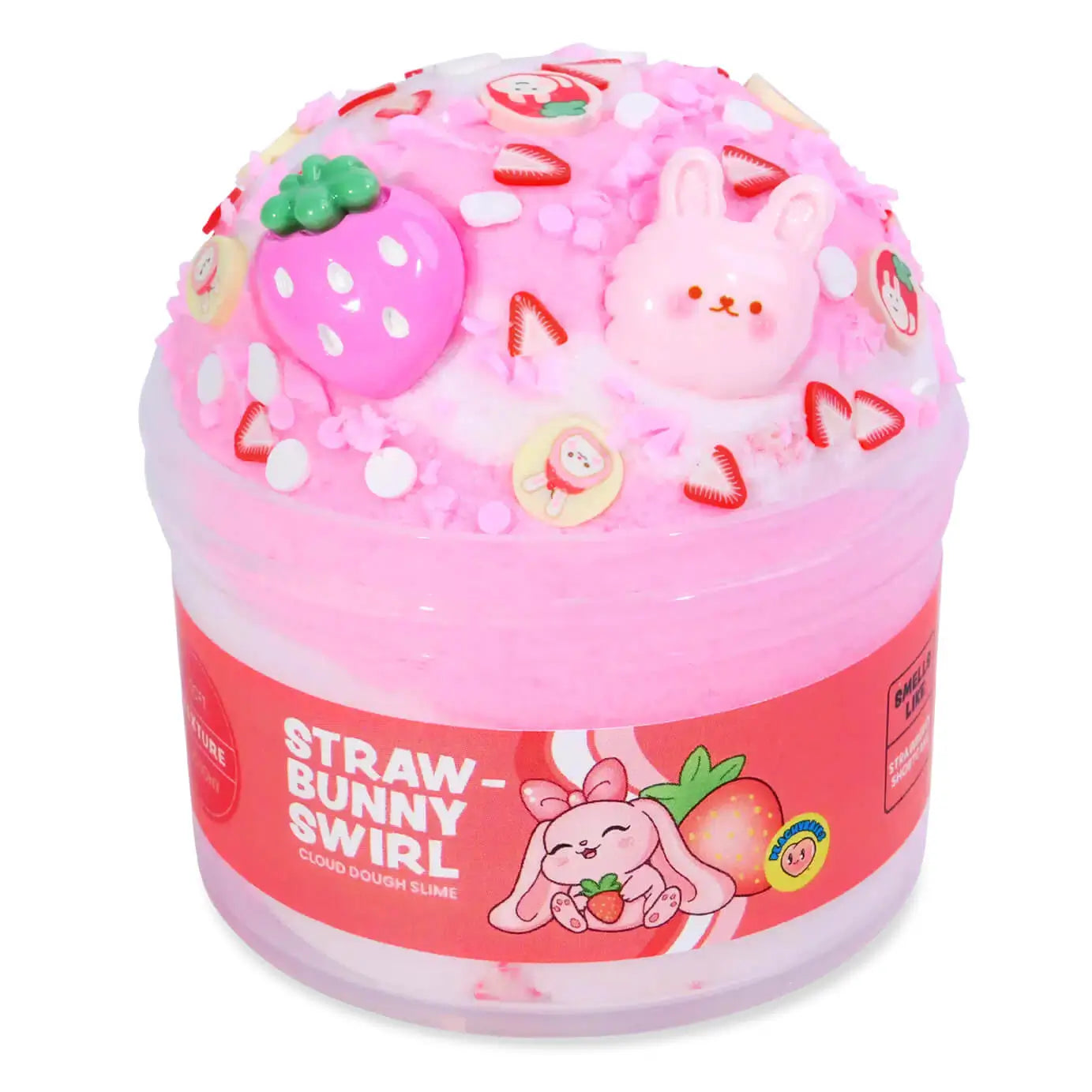 Vibrant pink cloud dough slime in a clear jar, decorated with strawberry and bunny charms plus candy-like sprinkles, labeled “Straw-Bunny Swirl” by Peachybbies for playful sensory fun.