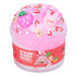 Vibrant pink cloud dough slime in a clear jar, decorated with strawberry and bunny charms plus candy-like sprinkles, labeled “Straw-Bunny Swirl” by Peachybbies for playful sensory fun.