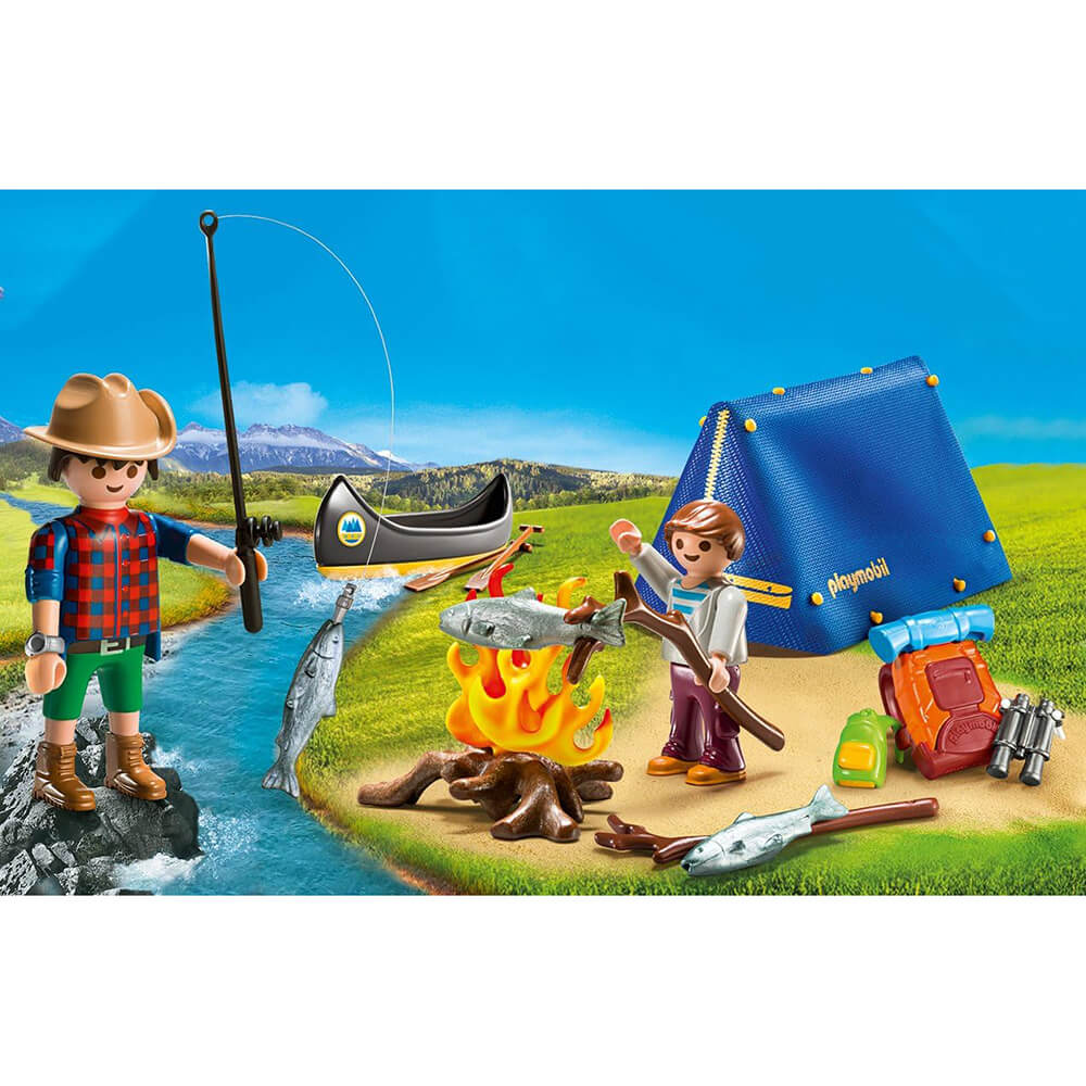 PLAYMOBIL Camping Adventure Carry Case (9323) Pices set up with background of camp site