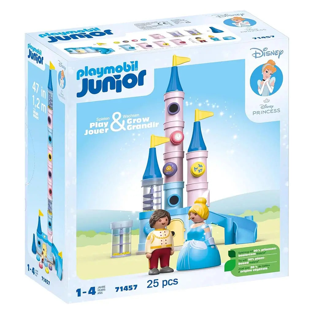 The Playmobil Junior Disney Princess castle playset box shows the tall pastel castle with yellow flags, spiral-ramp canister, and Cinderella and Prince figures, highlighting the 25-piece set for young builders.