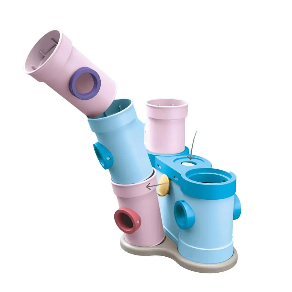 Pastel blue and pink tubular castle parts connect at adjustable angles with circular ports, demonstrating how the Playmobil Disney castle sections pivot and stack for customizable tower-building play.