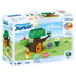 Disney Playmobil Junior Winnie the Pooh packaging featuring green tree house with smooth rounded branches, swing accessory, shape blocks, and figures illustrated in a gentle meadow-themed background.