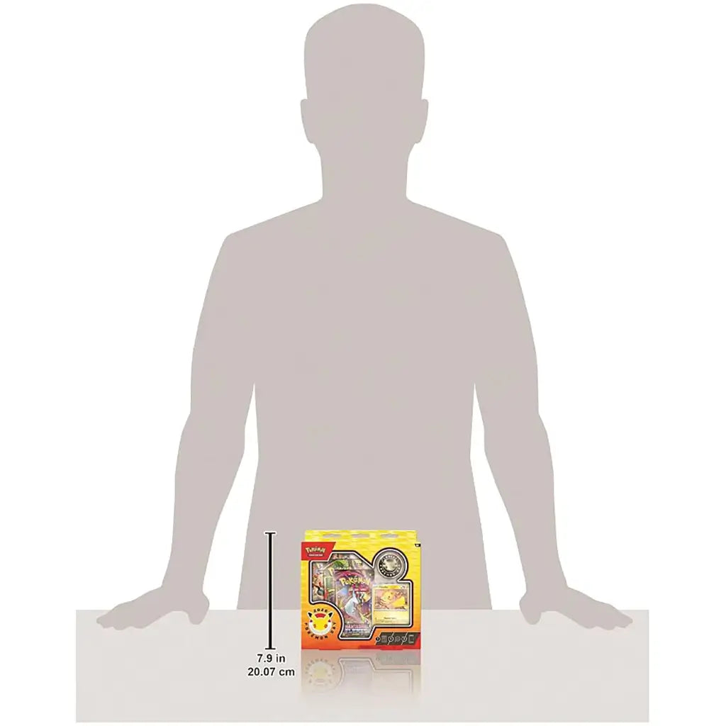 Pokémon TCG Pokémon Day 2026 Collection box appears in yellow and orange packaging beside a gray human silhouette, showing a product height of 7.9 inches or 20.07 cm.