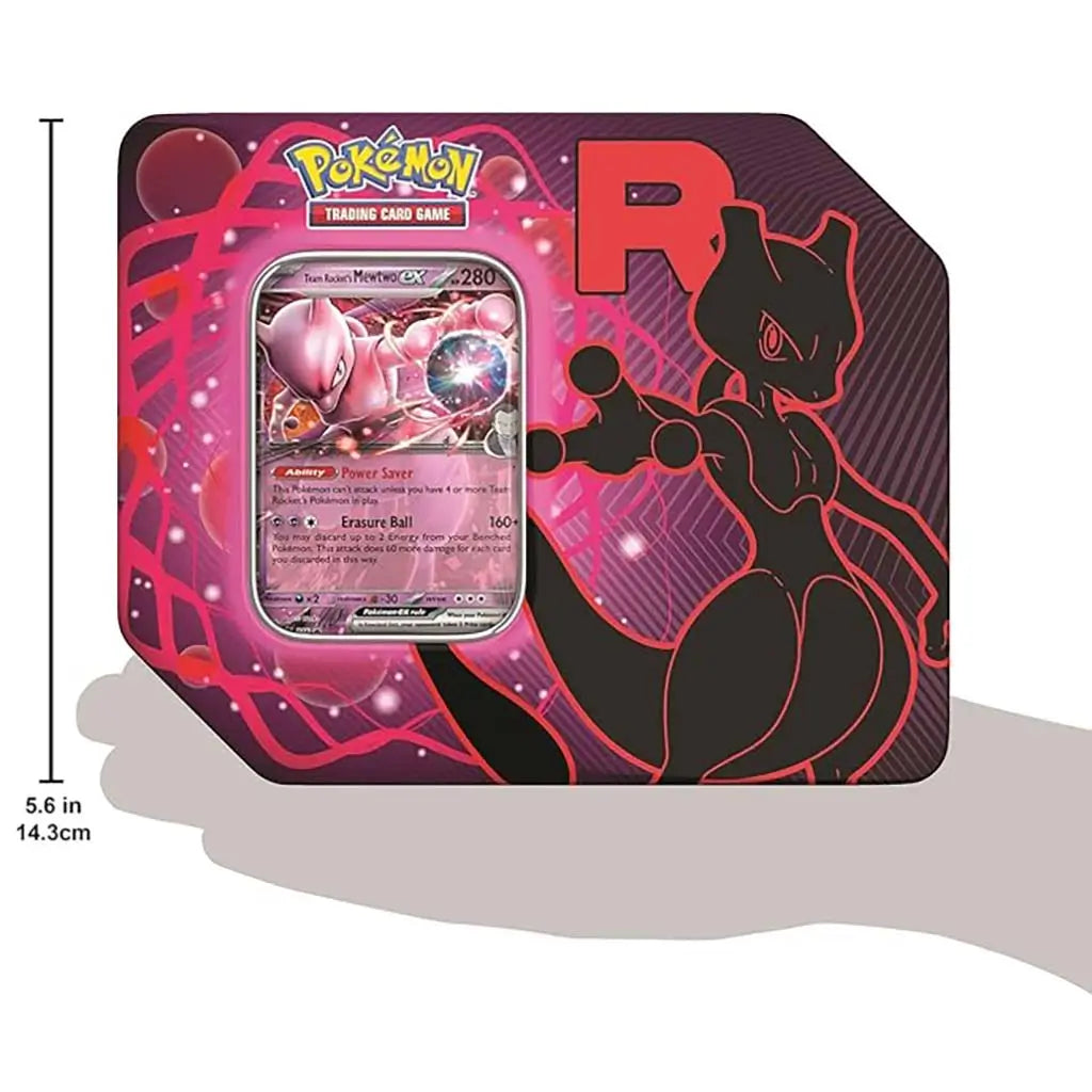 Pokémon TCG Team Rocket tin in pink and black metal shows the centered Mewtwo ex promo card with swirling energy rings and a measurement guide marking 5.6 inches tall around the radiant design.