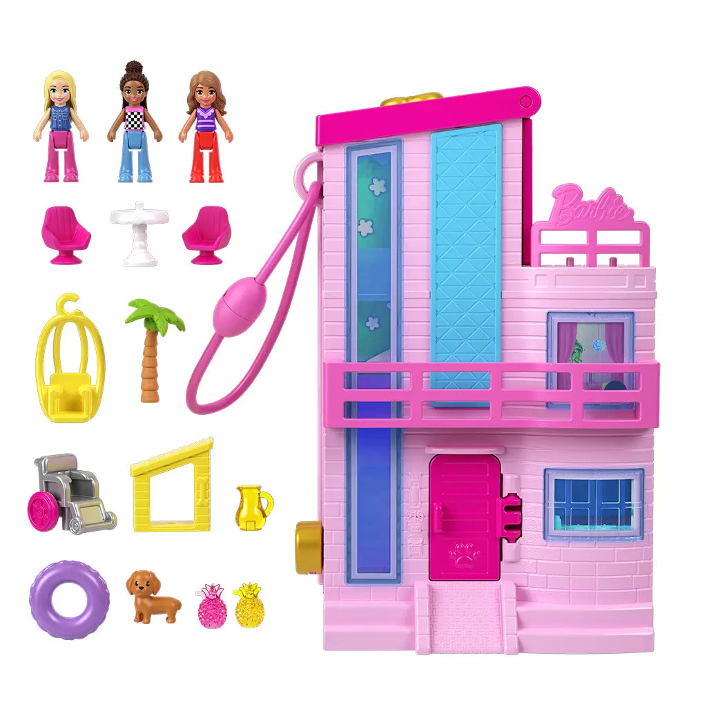Polly Pocket Barbie Dreamhouse Compact set with closed pink house, three dolls, wheelchair, dog, furniture, pool float, and small accessories arranged neatly.