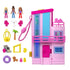 Polly Pocket Barbie Dreamhouse Compact set with closed pink house, three dolls, wheelchair, dog, furniture, pool float, and small accessories arranged neatly.