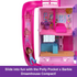 Interior view of Polly Pocket Barbie Dreamhouse Compact with doll sliding down a bright pink curved slide from upper floor into play area beside kitchen space.