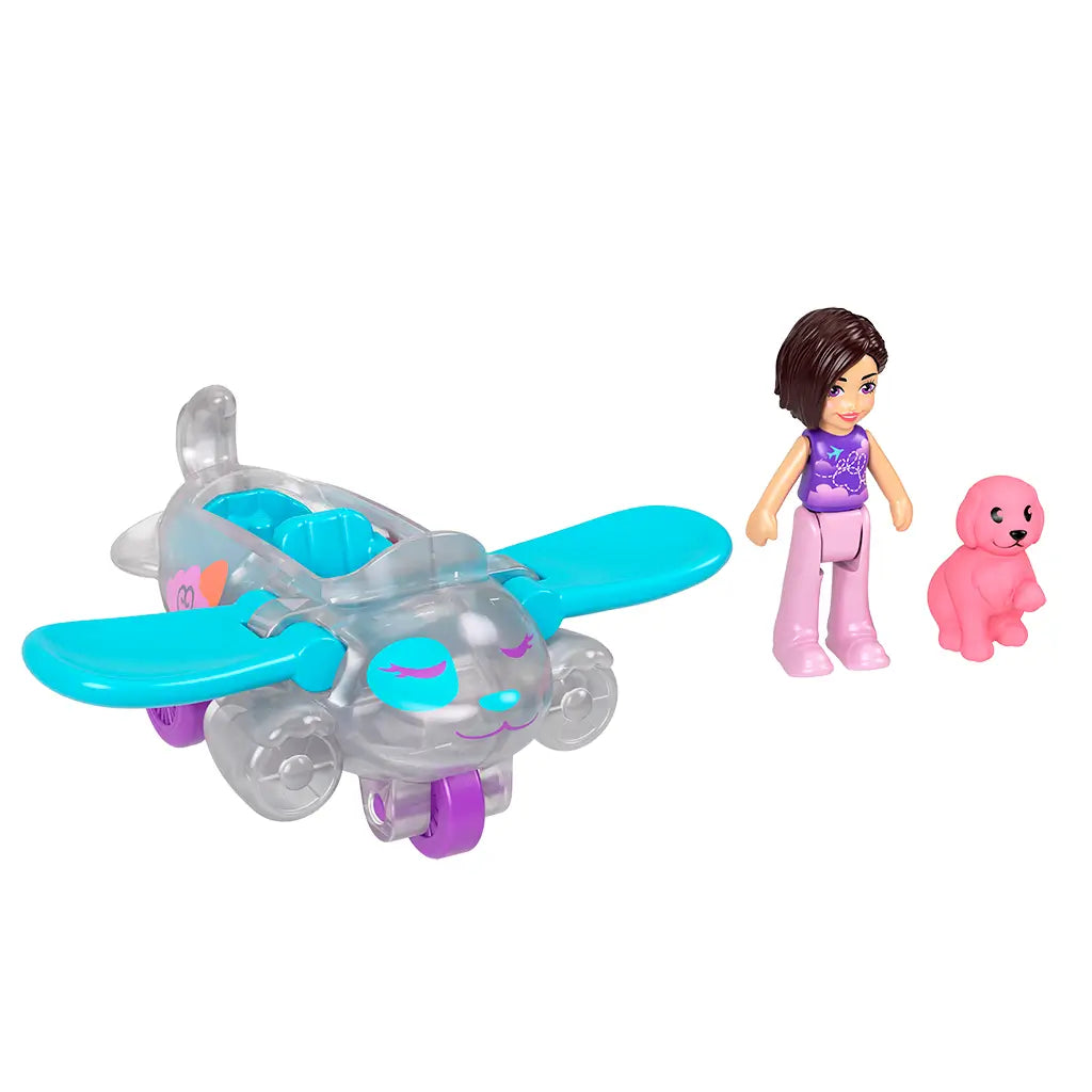 Polly Pocket silver airplane with blue wings next to Polly doll in purple top and pink pants, and small pink dog figure, arranged on white background.