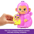 Hand holding Polly Pocket 2-in-1 compact playset featuring large pink momma monkey with smiling baby monkey compact in yellow, both designed for portable play fun.