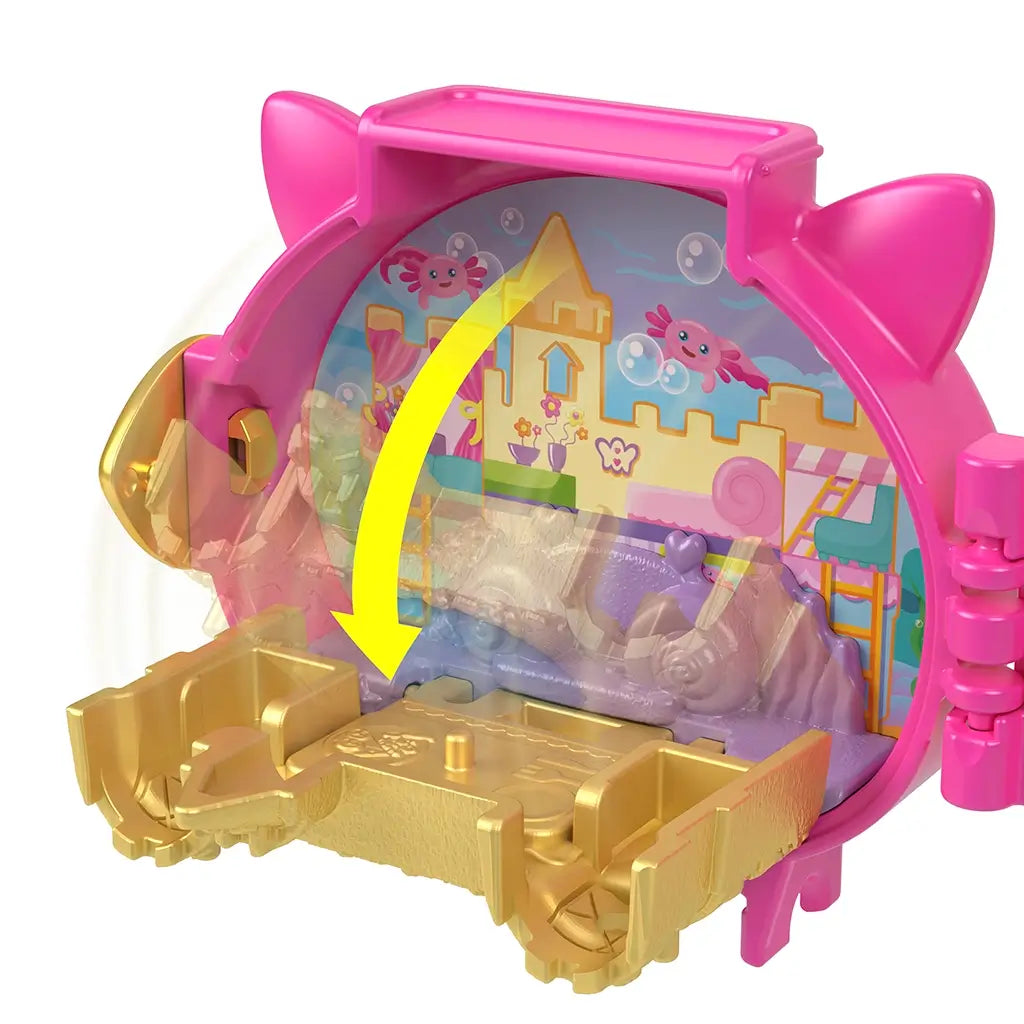 Polly Pocket playset flip feature displays gold castle-shaped furniture folding inside the compact with illustrated underwater castle backdrop and arrow highlighting the transformation motion.