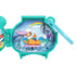 Inside the Polly Pocket Otter Locket playset, a small orange otter figure rides a pink surfboard on molded ocean waves, with painted rainbow, sailboat, and dolphins decorating the backdrop.