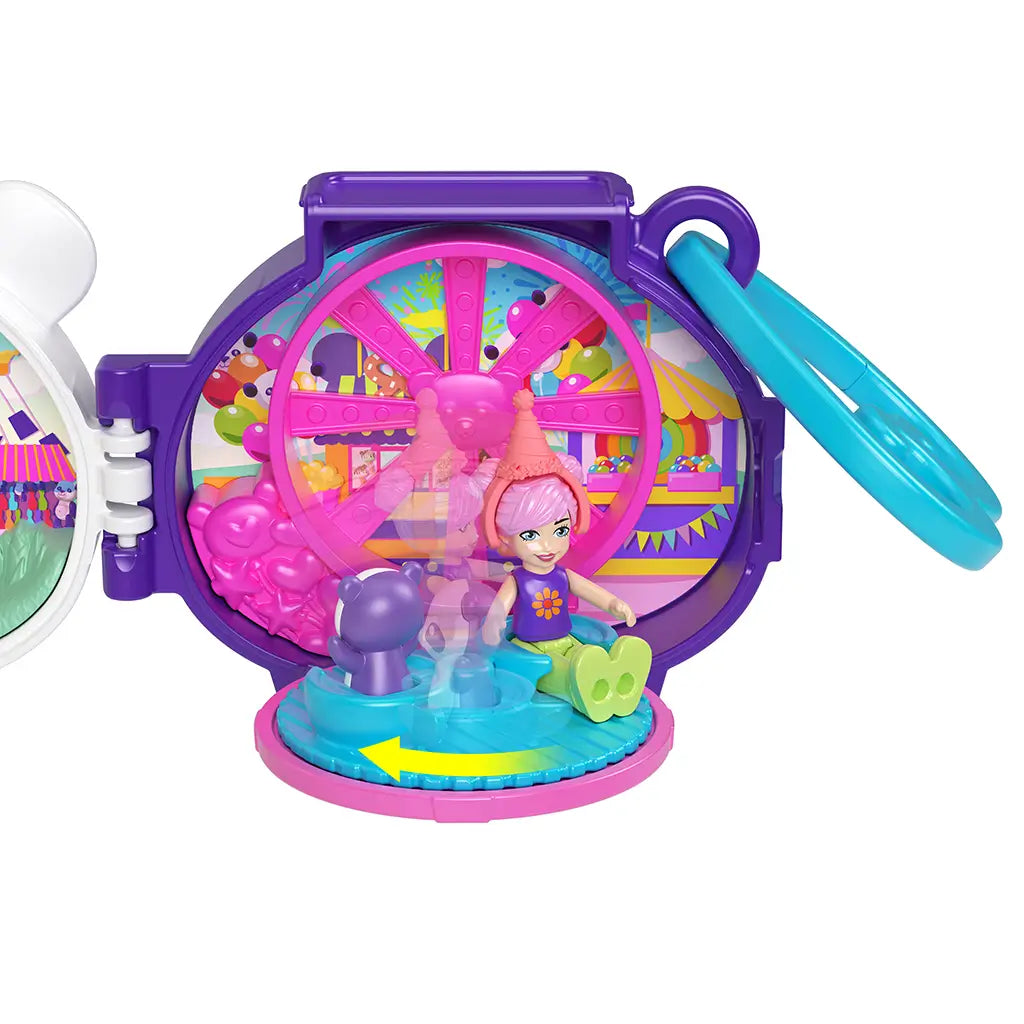 Polly Pocket panda locket playset fully opened to show Ferris wheel and carnival rides in purple, pink, and yellow colors, with doll sitting inside surrounded by bright illustrated scenery.