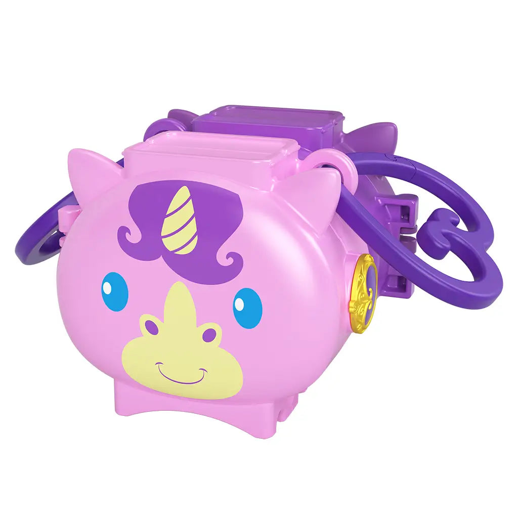 Pink Polly Pocket unicorn locket-shaped compact with purple mane, golden horn, and purple carrying strap, designed as a portable playset for kids on the go.
