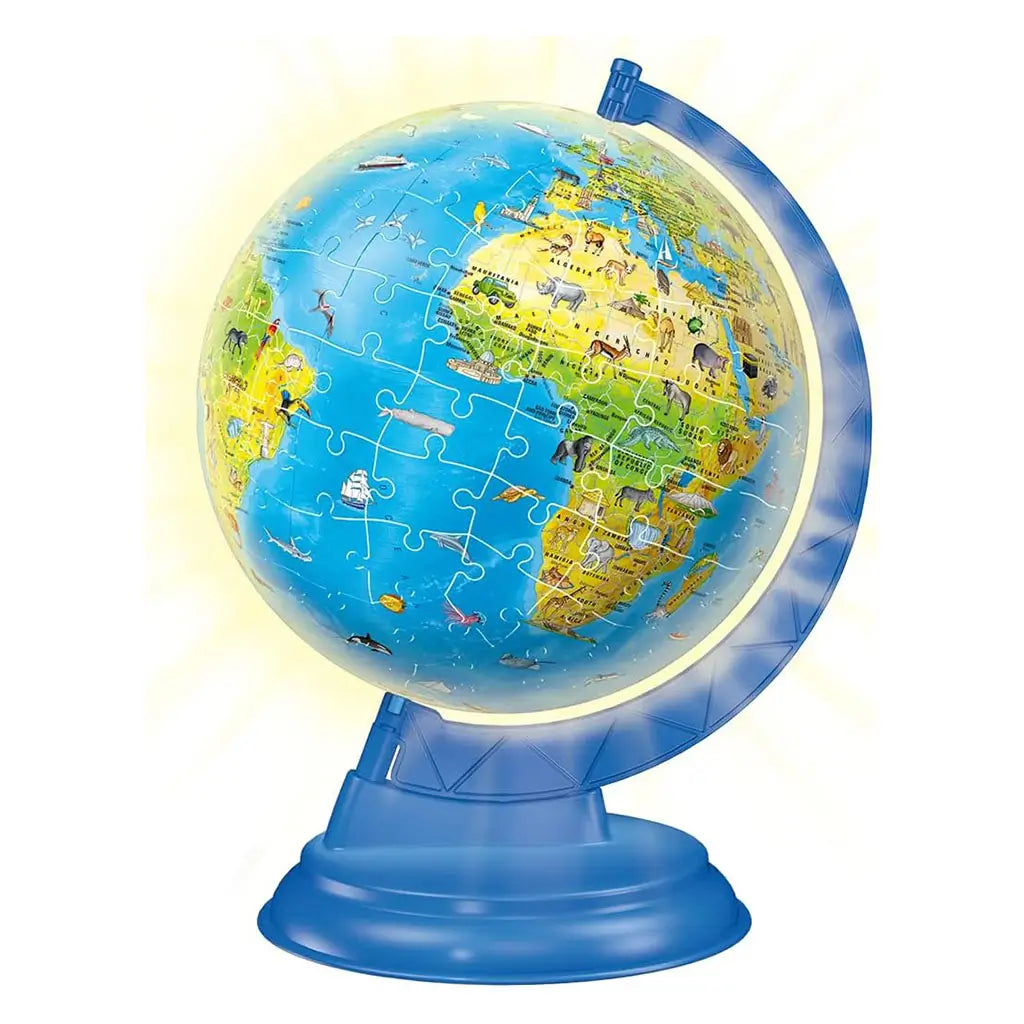 Completed Ravensburger 3D Children’s Globe Night Edition glowing on a blue stand, with colorful continents illustrated with animals and landmarks for educational display.