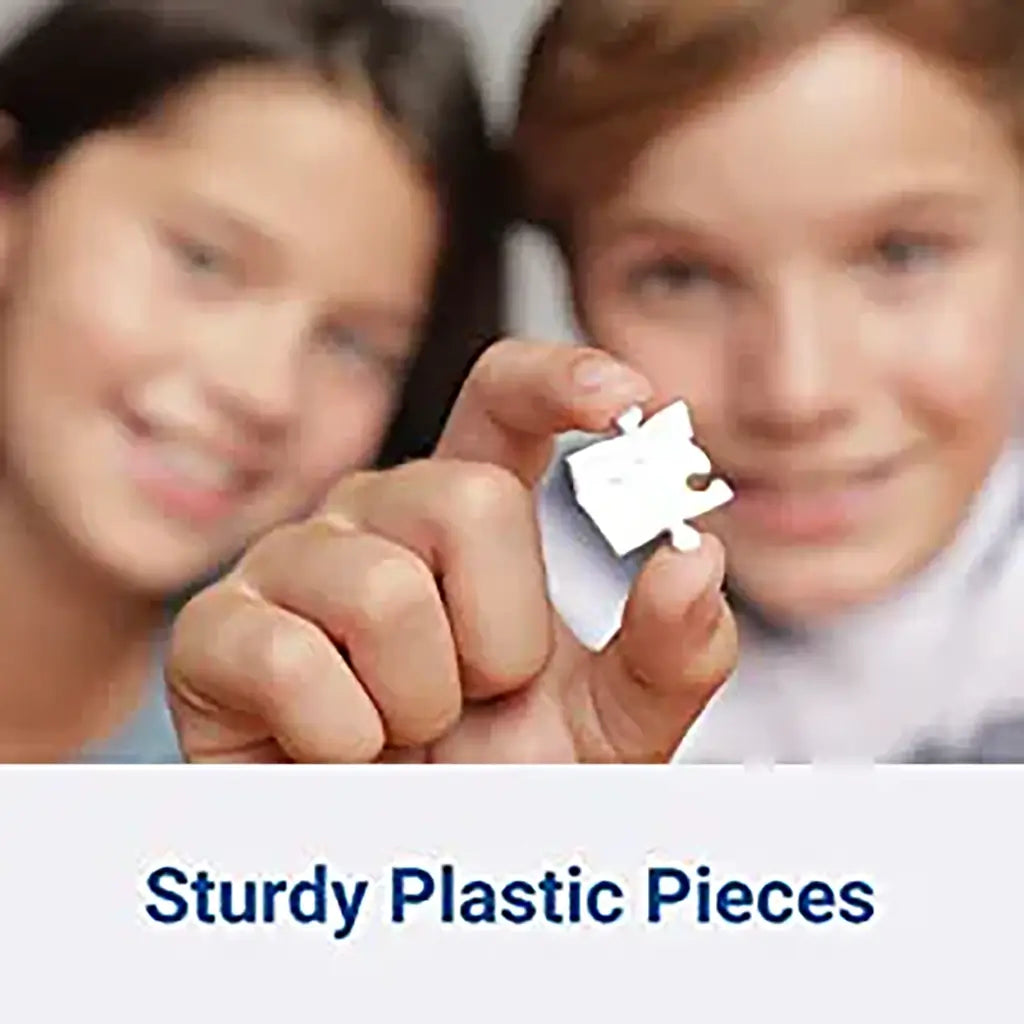 Two children smiling as one holds up a sturdy white Ravensburger puzzle piece, highlighting durable plastic construction designed for easy 3D globe building.