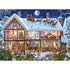 Festive winter scene puzzle showing a snow-covered house decorated for Christmas, with Santa and reindeer on the roof and cozy indoor holiday activities.