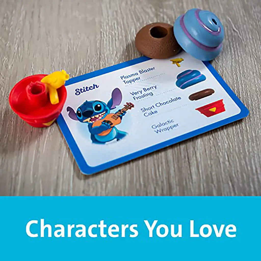 Disney Enchanted Cupcake Party game card featuring Stitch with matching cupcake parts including topper, frosting, cake base, and wrapper, shown on wooden background.