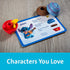 Disney Enchanted Cupcake Party game card featuring Stitch with matching cupcake parts including topper, frosting, cake base, and wrapper, shown on wooden background.