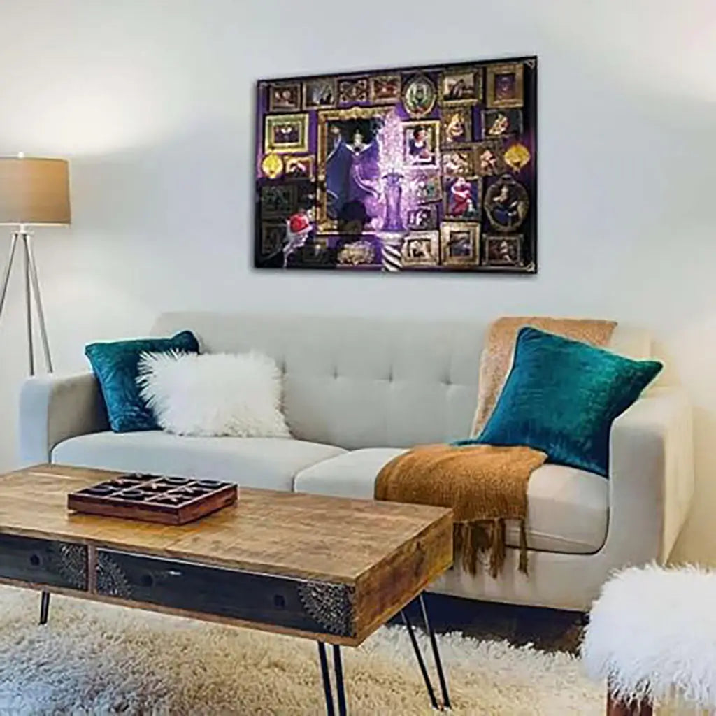 Modern living room with framed Ravensburger Disney Villainous Evil Queen puzzle artwork on the wall, showing purple design and classic Snow White scenes as decorative wall art.