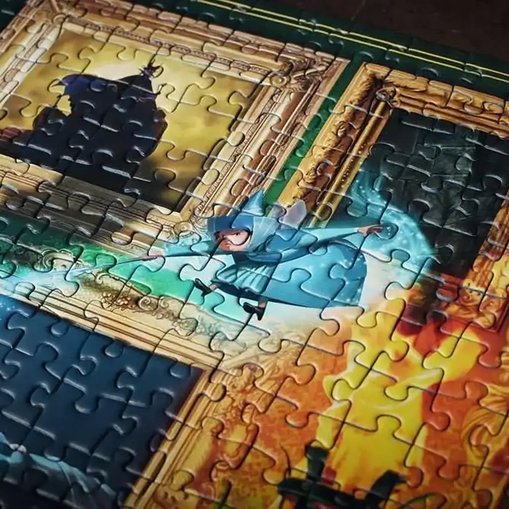 Anti-glare close-up of assembled Ravensburger Disney Villainous Maleficent puzzle showing Fairy character in blue robe within ornate gold frame and rich illustrated details.