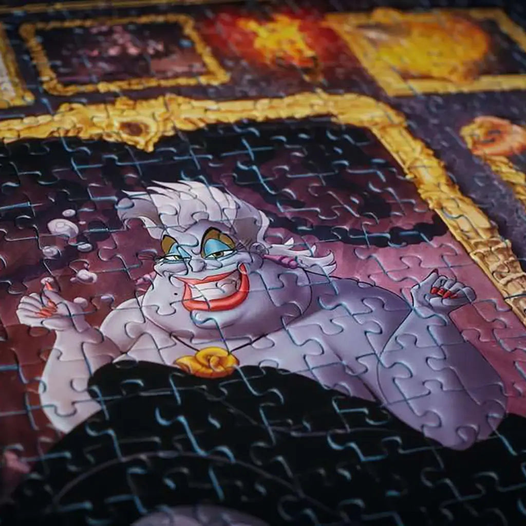 Close-up of Ravensburger Disney Villainous puzzle featuring Ursula in gold frame, with crisp, clean-cut jigsaw pieces interlocking seamlessly for premium assembly experience.
