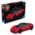 Man assembles Ravensburger Ferrari SF90 Stradale 3D puzzle at a workbench surrounded by red, white, and black pieces.