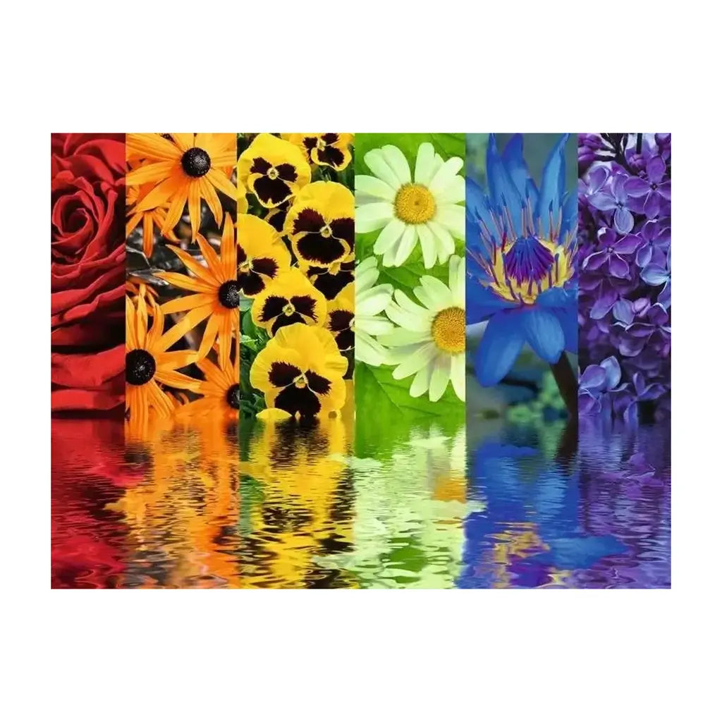 Completed Ravensburger Floral Reflections puzzle showing a vivid rainbow gradient of red roses, orange lilies, yellow pansies, daisies, blue lotus, and purple lilacs.