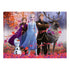 Completed Ravensburger Frozen II puzzle showing Anna, Elsa, Kristoff, Sven, and Olaf standing together in a forest with colorful red and orange leaves falling around them.