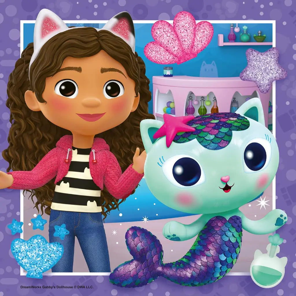 Cartoon girl from Gabby’s Dollhouse wearing cat ears stands with a mermaid cat character in a colorful playroom, decorated with sparkling stars and seashells.